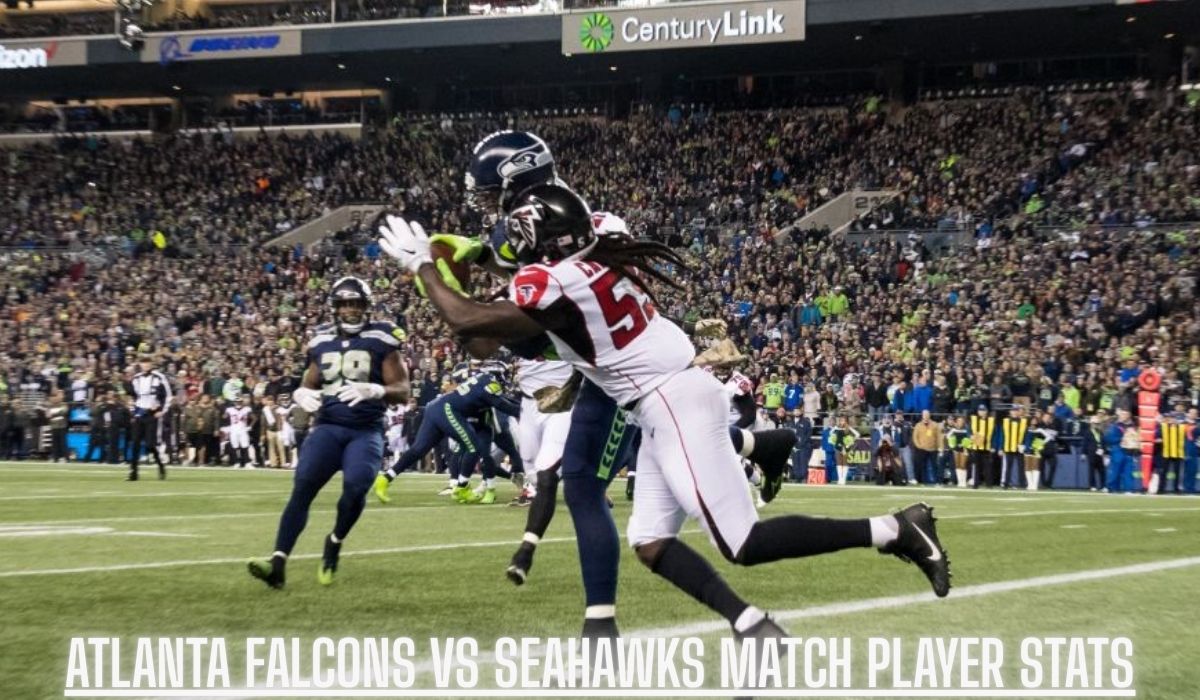 Atlanta Falcons player attempts to intercept a pass against the Seattle Seahawks during an NFL game, with a packed stadium crowd in the background. Text overlay reads 'Atlanta Falcons vs Seahawks Match Player Stats.