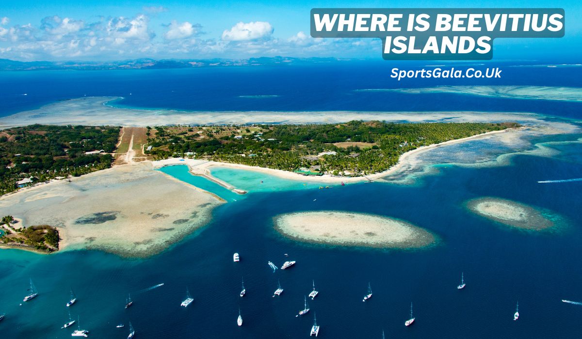 "Aerial view of tropical BeeVitius Islands with turquoise lagoons, coral reefs, and boats anchored near the shore, travel banner with text 'Where is BeeVitius Islands'." By sportsgala.co.uk