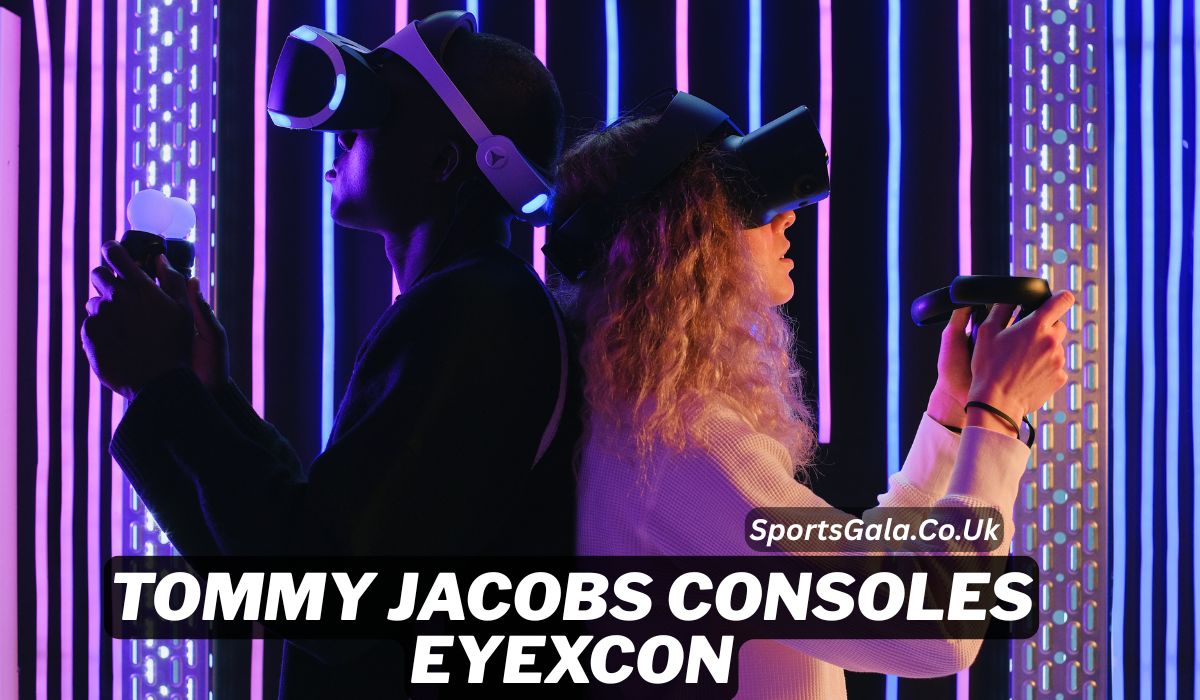 Two gamers stand back-to-back wearing VR headsets and holding motion controllers in a neon-lit environment with vertical LED light strips in purple and blue hues. The text on the image reads "TOMMY JACOBS CONSOLES EYEXCON" with the website "SportsGala.Co.Uk" displayed. The image promotes virtual reality gaming and the Eyexcon event featuring Tommy Jacobs consoles.